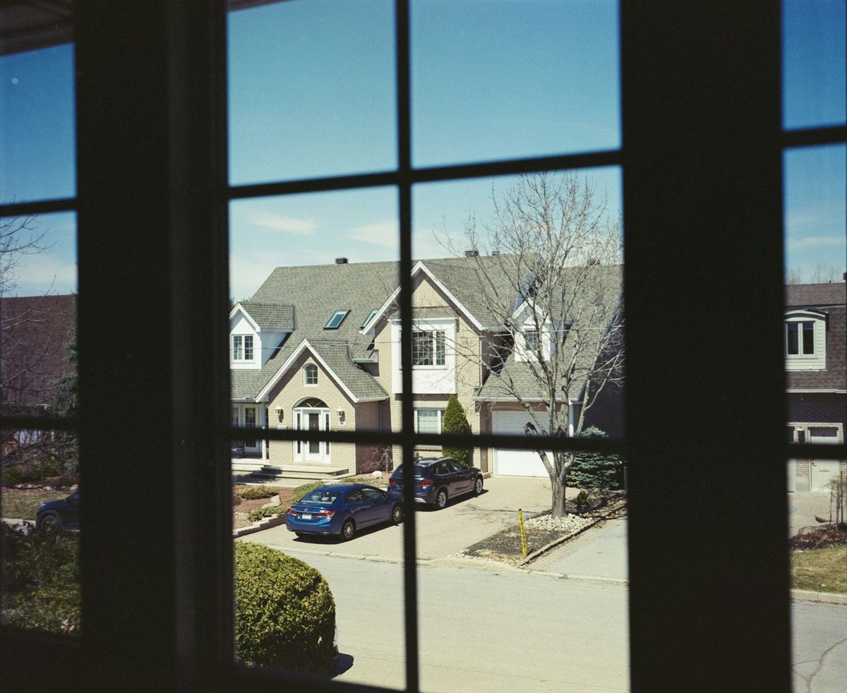 Window looking straight across at neighbors' houses